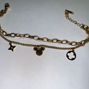 Chic Gold Charm Bracelet with Unique Pendants